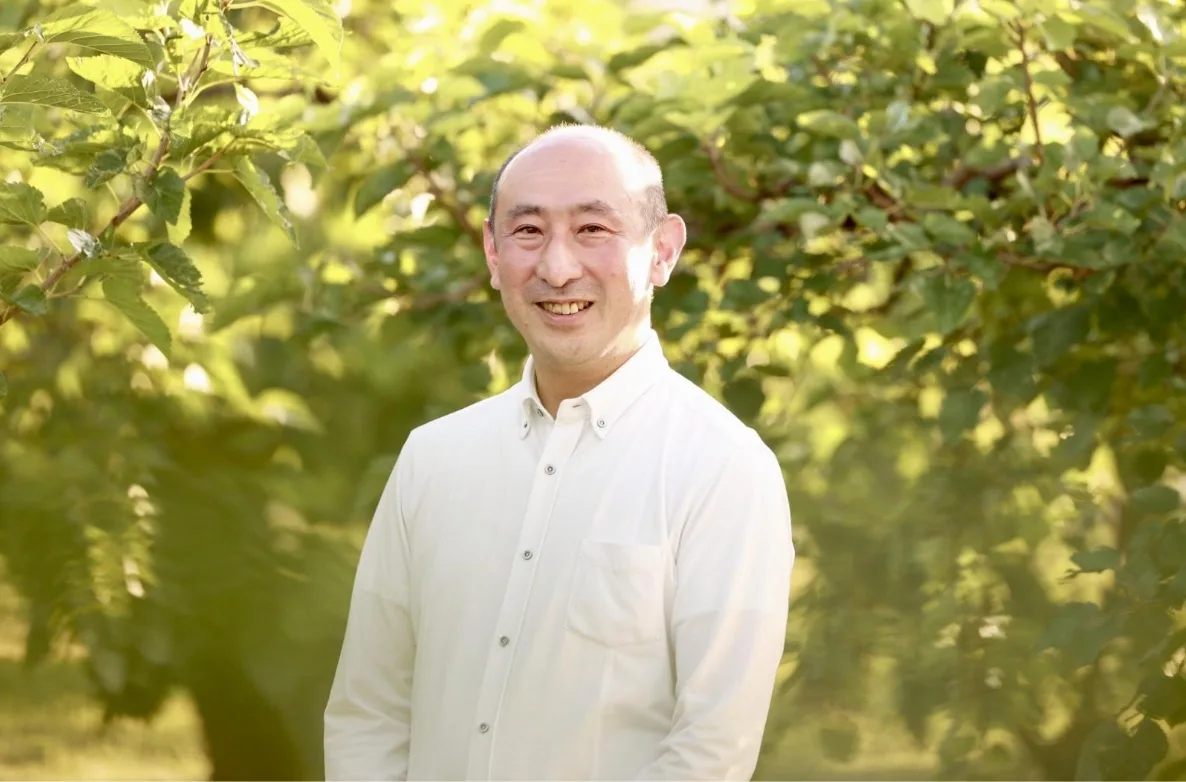 角田 哲啓 氏