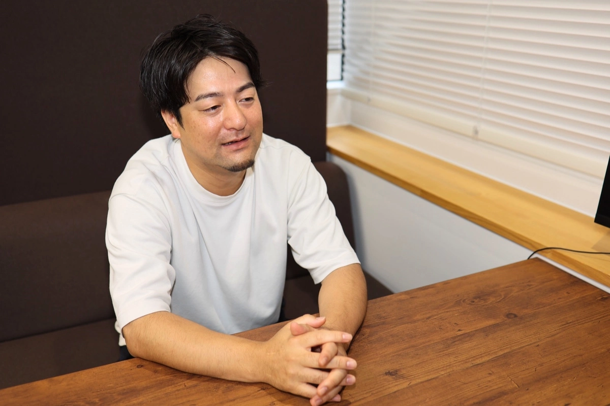 インタビューに答える川俣氏